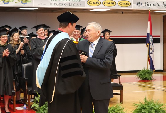Dr. Gilgour giving Harvey Faircloth an award at graduation