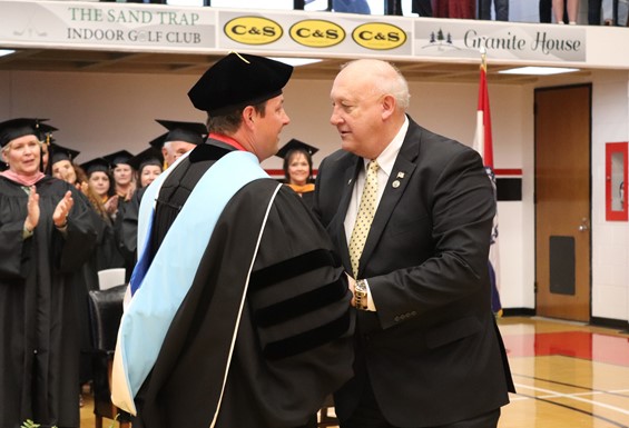 Dr. Gilgour giving Dale Wright an award at graduation