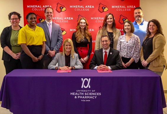 Group photo of UHSP and MAC representatives smiling